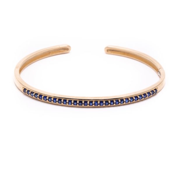 Hinged Shared Prong Cuff Bracelet with Blue Sapphires in 14K Yellow Gold