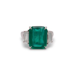 Three Stone Emerald Ring in Platinum with Diamond Trapezoid Side Stones